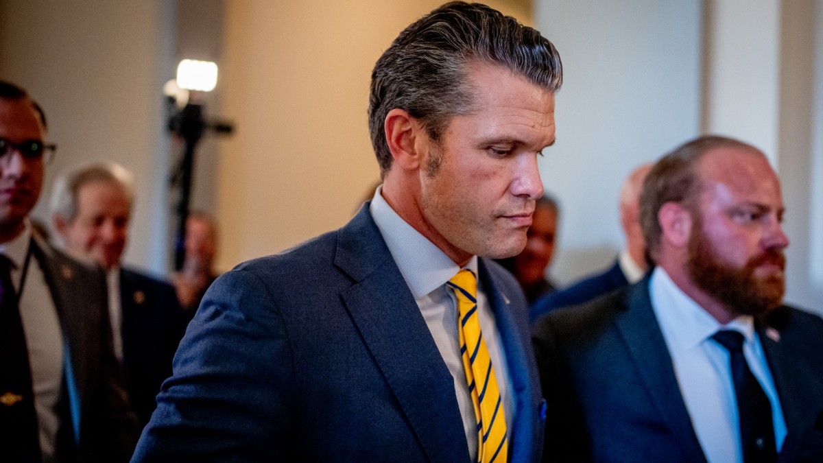 Pete Hegseth walks through the Russell Senate Office building on Capitol Hill on December 3