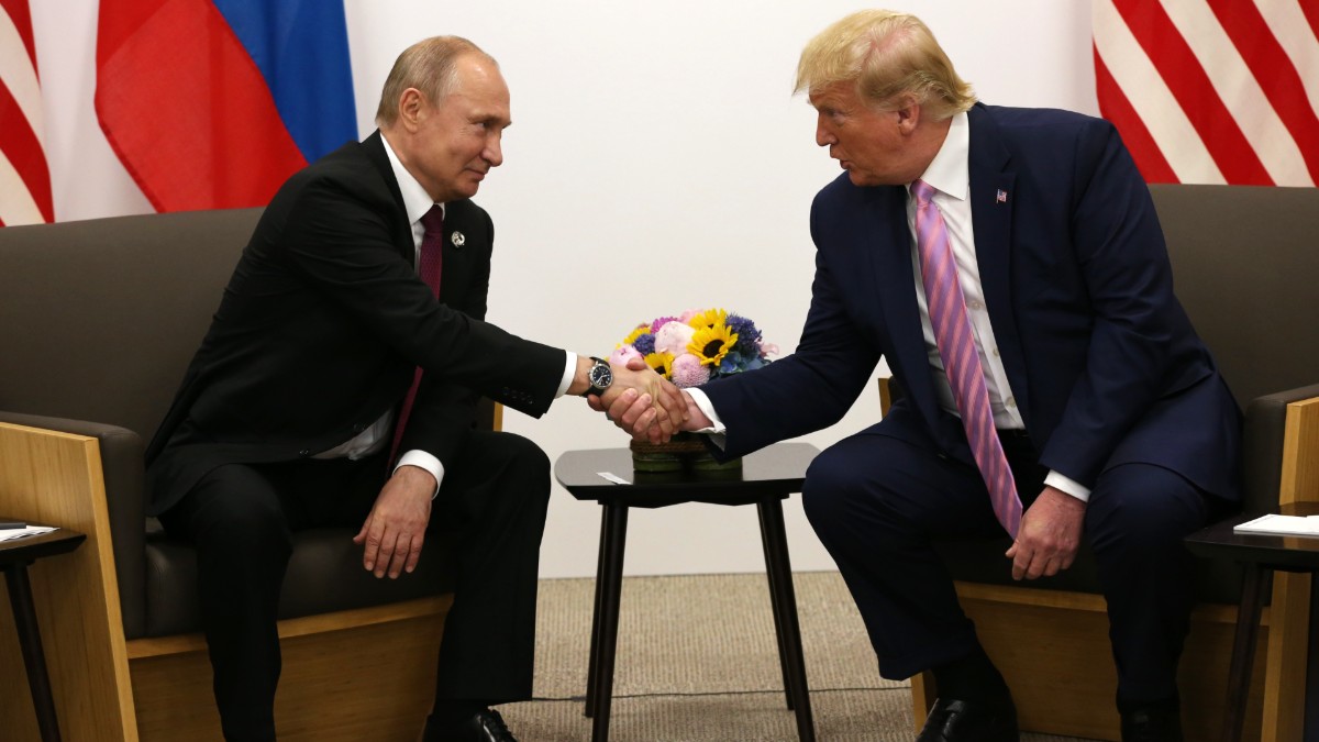 Vladimir Putin and Donald Trump shake hands during the G20 Osaka Summit 2019