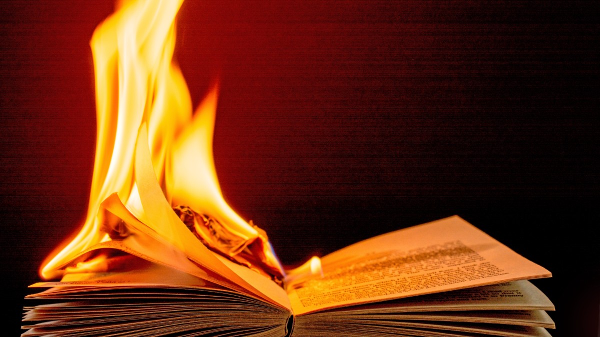 An open book on fire