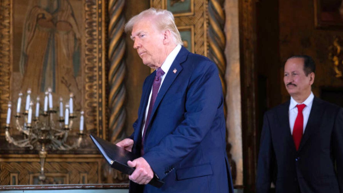 PALM BEACH, FLORIDA - JANUARY 07: President-elect Donald Trump arrives with DAMAC Properties CEO Hussain Sajwani for a press conference at the Mar-a-Lago Club on January 07, 2025 in Palm Beach, Florida. Trump joined Sajwani at the press conference to announce a $20 billion investment to build data centers in the United States. Trump will be sworn in as the 47th president of the United States on January 20, making him the only president other than Grover Cleveland to serve two non-consecutive terms in the office. (Photo by Scott Olson/Getty Images)