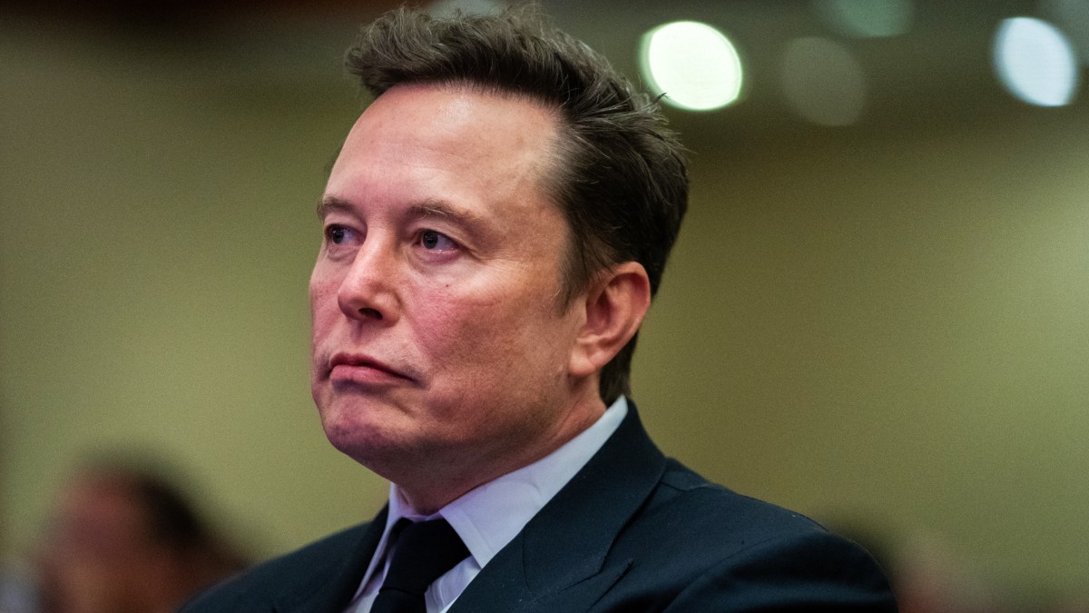 Elon Musk listens to Trump speak at a House Republicans Conference meeting