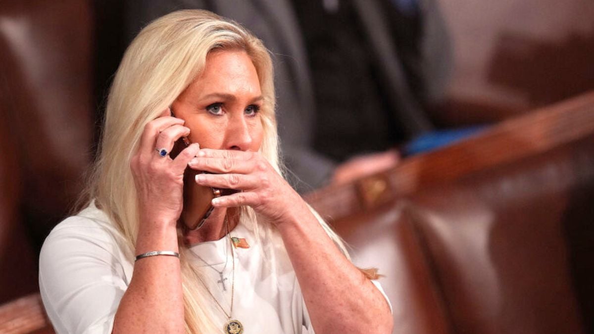 WASHINGTON, DC - JANUARY 03: U.S. Rep. Marjorie Taylor Greene (R-GA) talks on the phone as the House votes for a Speaker of the House on the first day of the 119th Congress in the House Chamber of the U.S. Capitol Building on January 03, 2025 in Washington, DC. Rep. Mike Johnson (R-LA) is working to retain the Speakership in the face of opposition within his own party as the 119th Congress holds its first session to vote for a new Speaker of the House. (Photo by Andrew Harnik/Getty Images)