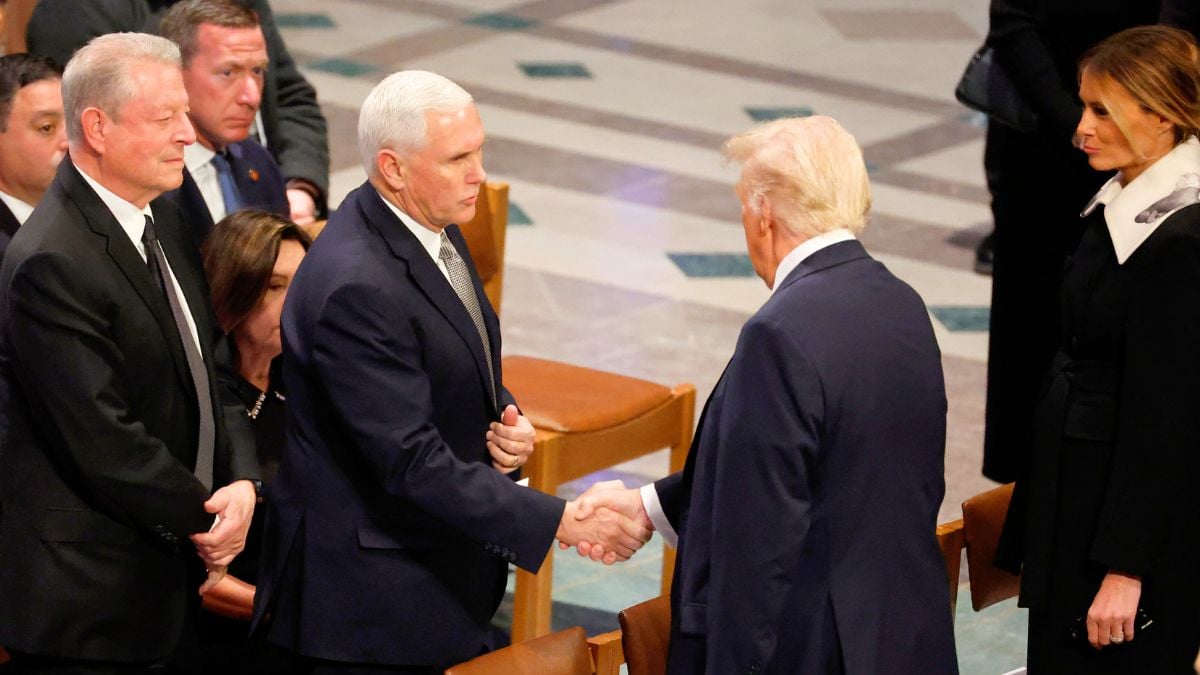 WASHINGTON, DC - JANUARY 09: U.S. President-elect Donald Trump greets former U.S. Vice President Mike Pence as he arrives with Melania Trump as former U.S. Vice President Al Gore looks on during the state funeral for former U.S. President Jimmy Carter at Washington National Cathedral on January 09, 2025 in Washington, DC. President Joe Biden declared today a national day of mourning for Carter, the 39th President of the United States, who died at the age of 100 on December 29, 2024 at his home in Plains, Georgia. (Photo by Chip Somodevilla/Getty Images)