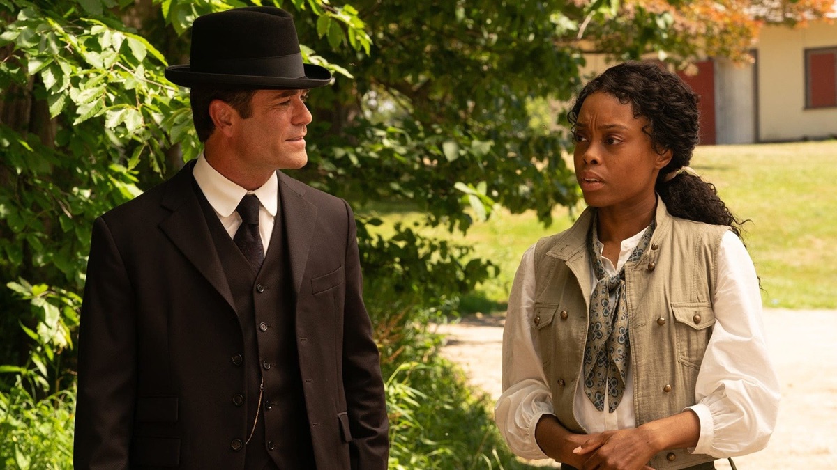 A dapper detective talks to a woman outdoors in "Murdoch Mysteries"